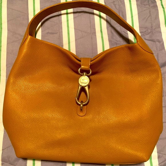 Dooney & Bourke Handbags - Dooney & Bourke mustard purse with coin purse/wallet